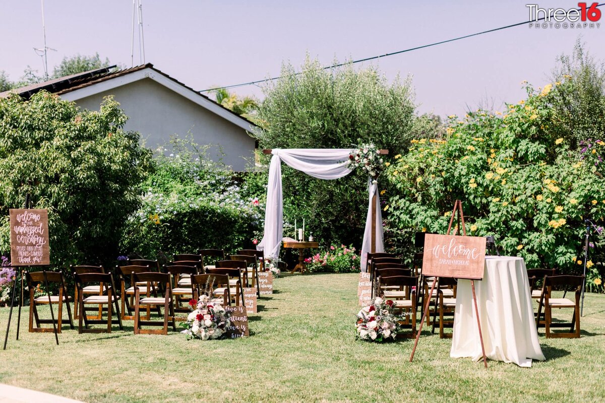 Outdoor wedding ceremony setup in a backyard for a small micro wedding