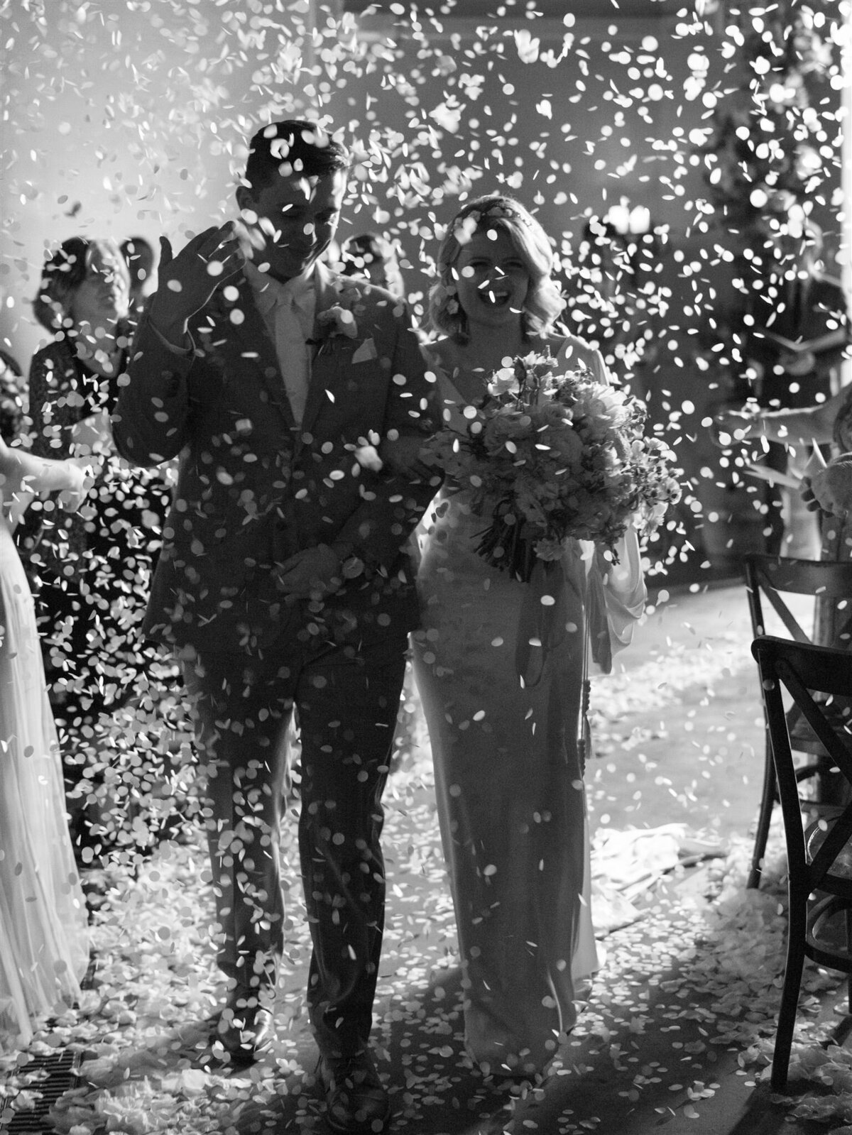petal toss exit from wedding ceremony atlanta and charleston fine art wedding photographer, film photographs by destination photography Hannah Forsberg