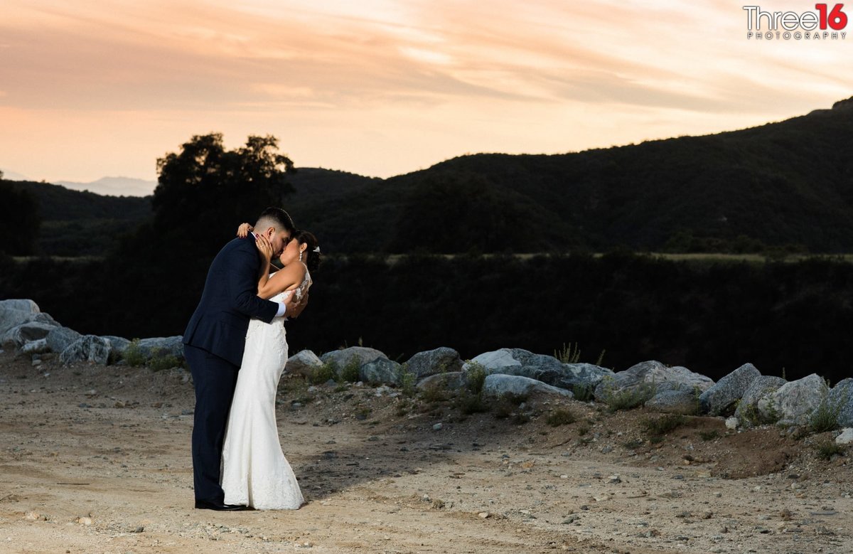 Bride and Groom share an intimate moment during a photo session