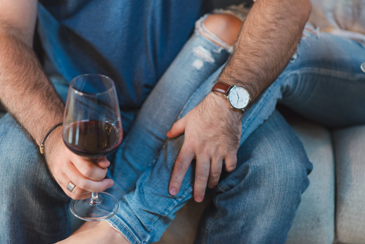 couple enjoying a glass of red wine together