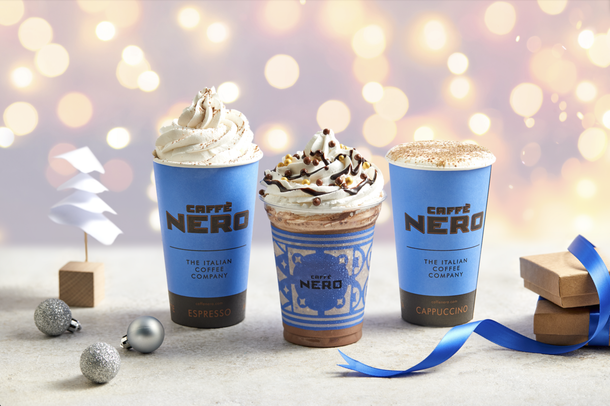 3 christmas crinks including a hot chocolate, a cappuccino and a frappuccino with whipped cream.