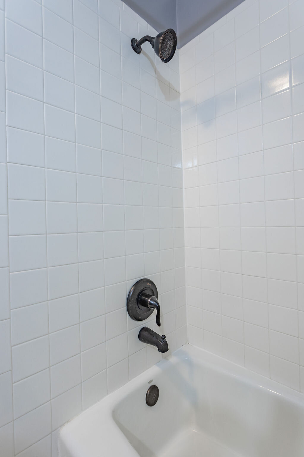 Bathtub in the spacious bathroom of this 5-bedroom, 4-bathroom vacation rental house for 16+ guests with pool, free wifi, guesthouse and game room just 20 minutes away from downtown Waco, TX.