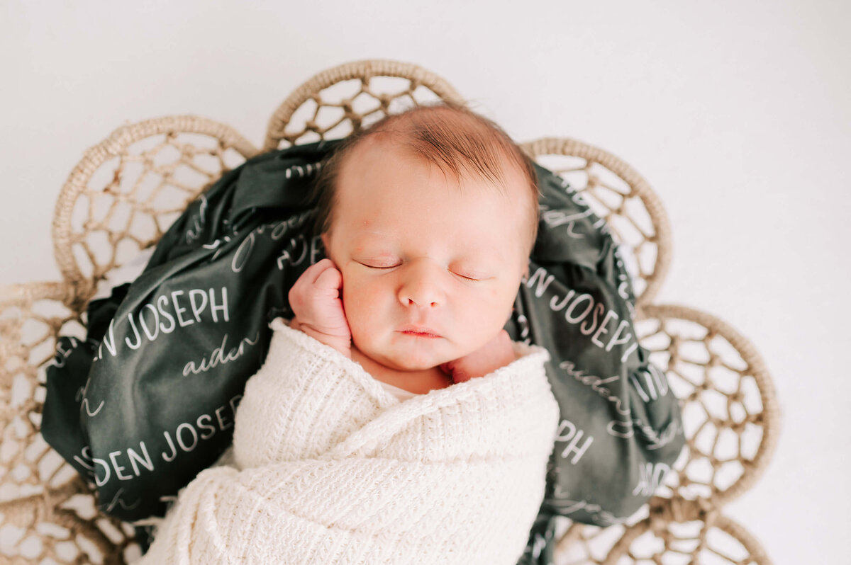 close up of sleeping newborn baby boy caprured by Springfield MO newborn photographer Jessica Kennedy of The Xo Photography