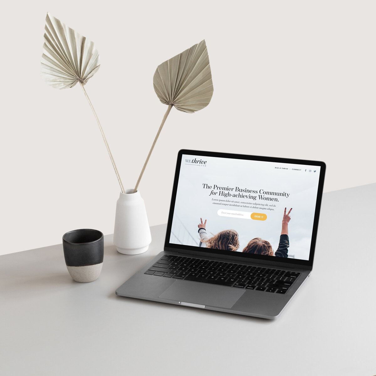business coach website design mocked up on a laptop scene