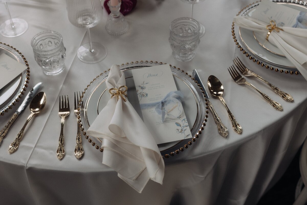 Wedding table setting with custom menu