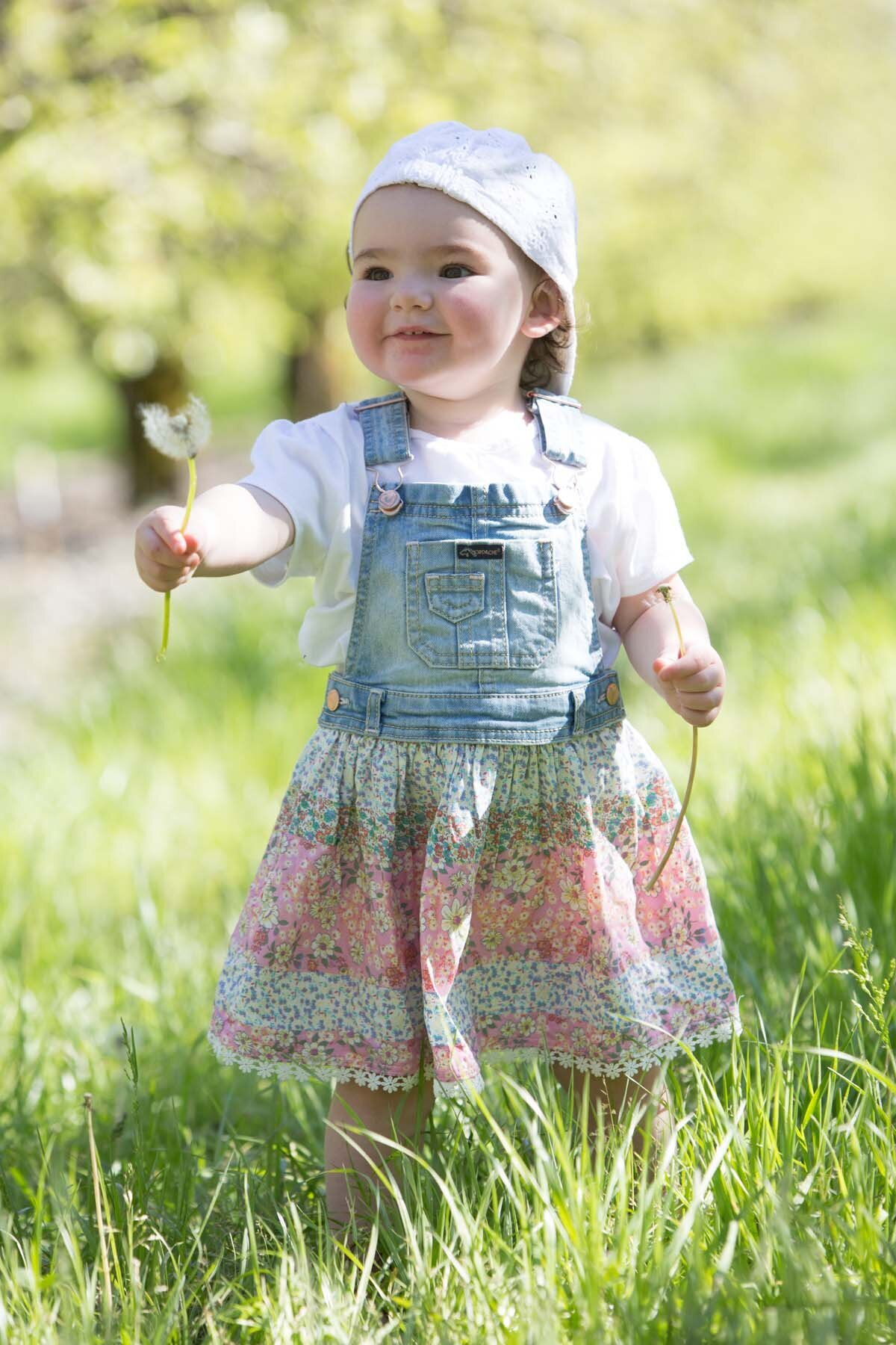 little girl with dandelion
