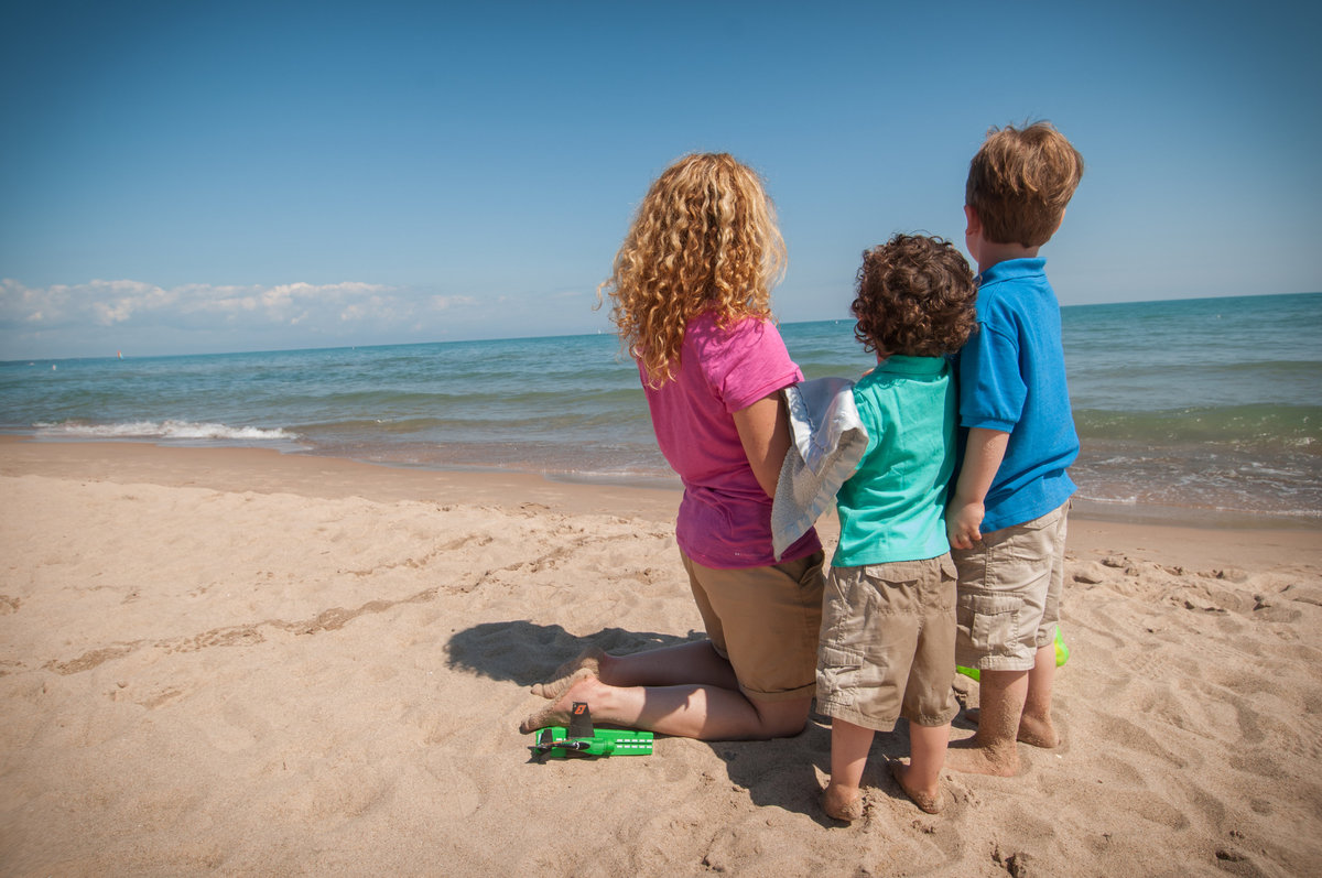 Single mom and her boys during a Lake Michigan beach family portrait session