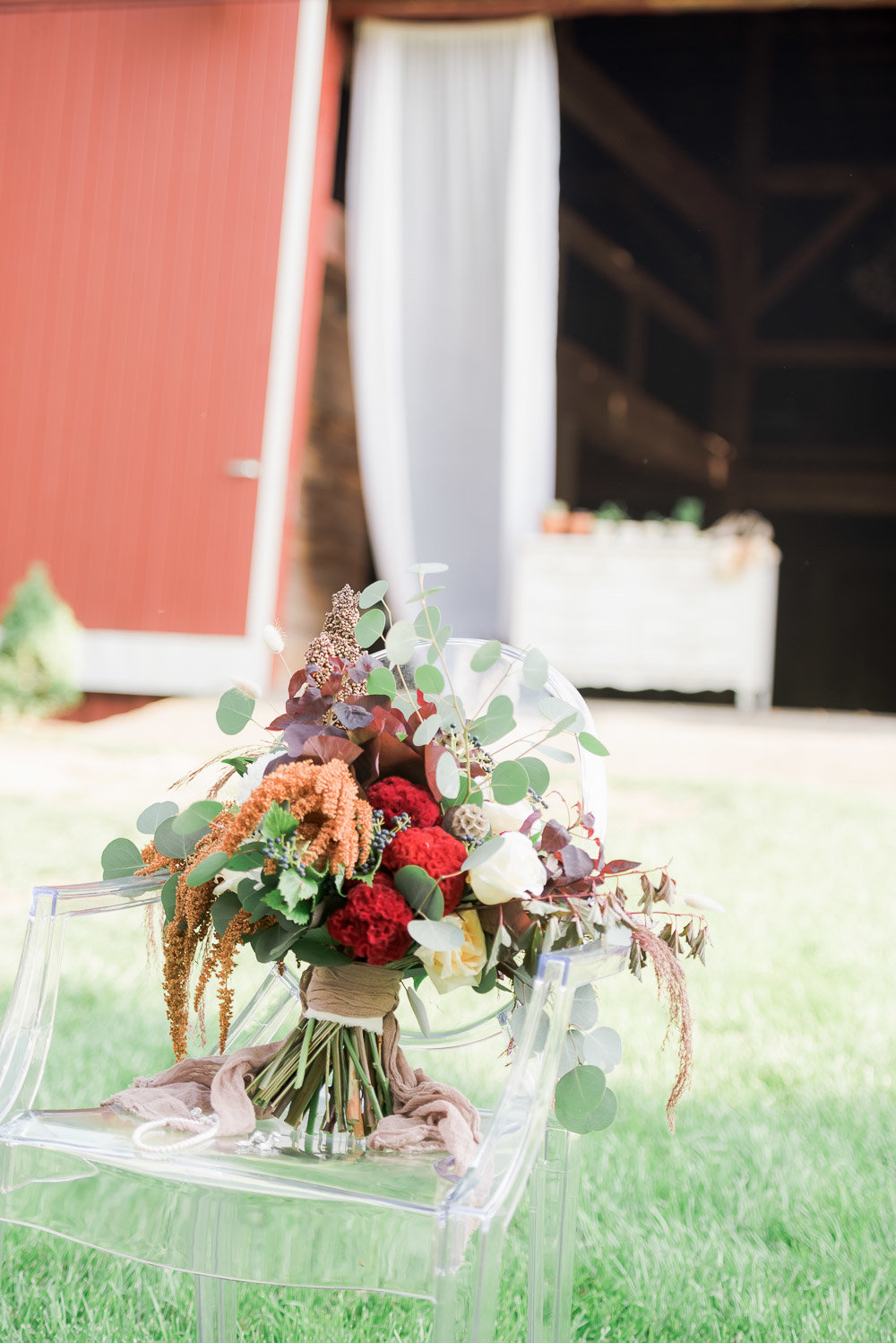 Wedding photographer got a close-up of a flower bouquet on a chair