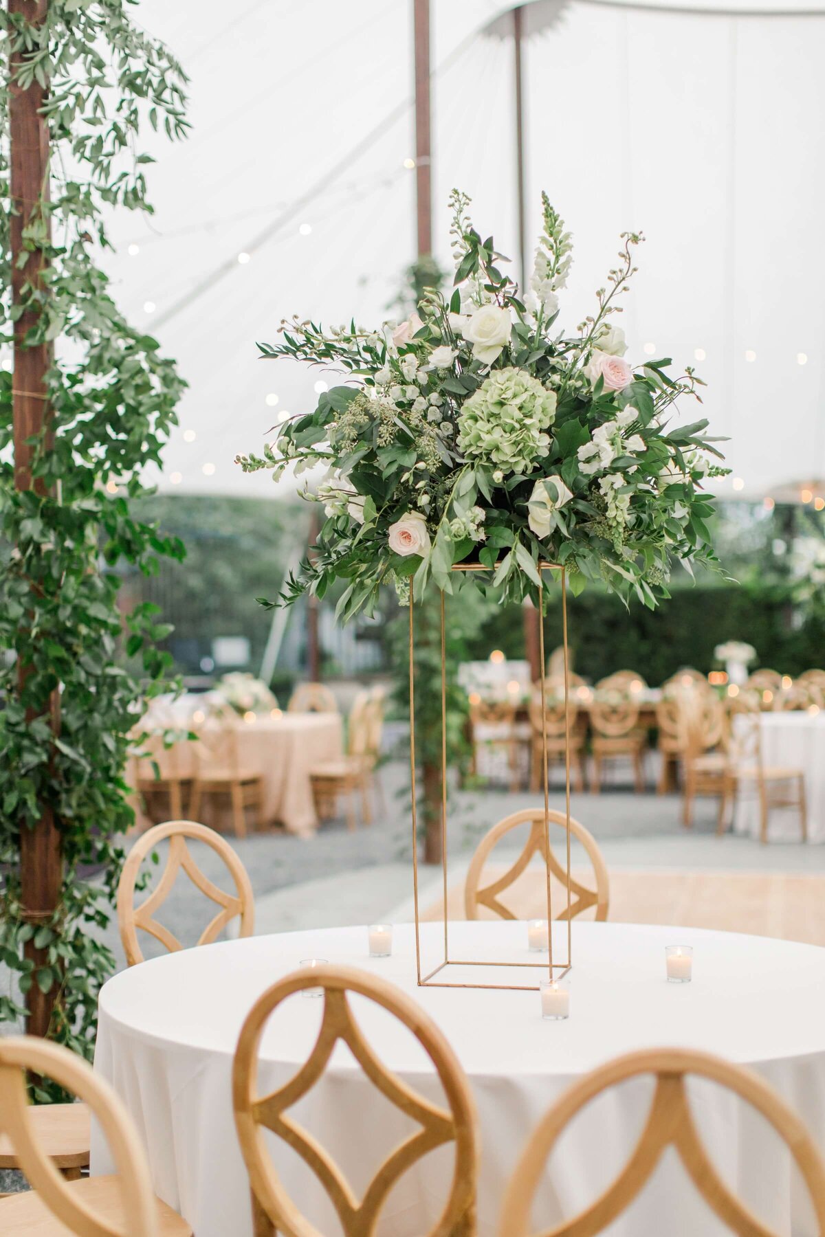 wedding reception tall floral arrangement
