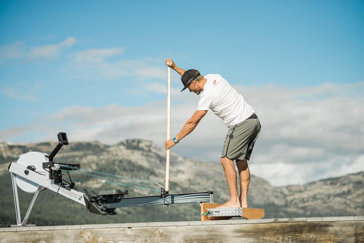 paddle pro athlete headshot demonstrating a paddle attachement to the concept machine