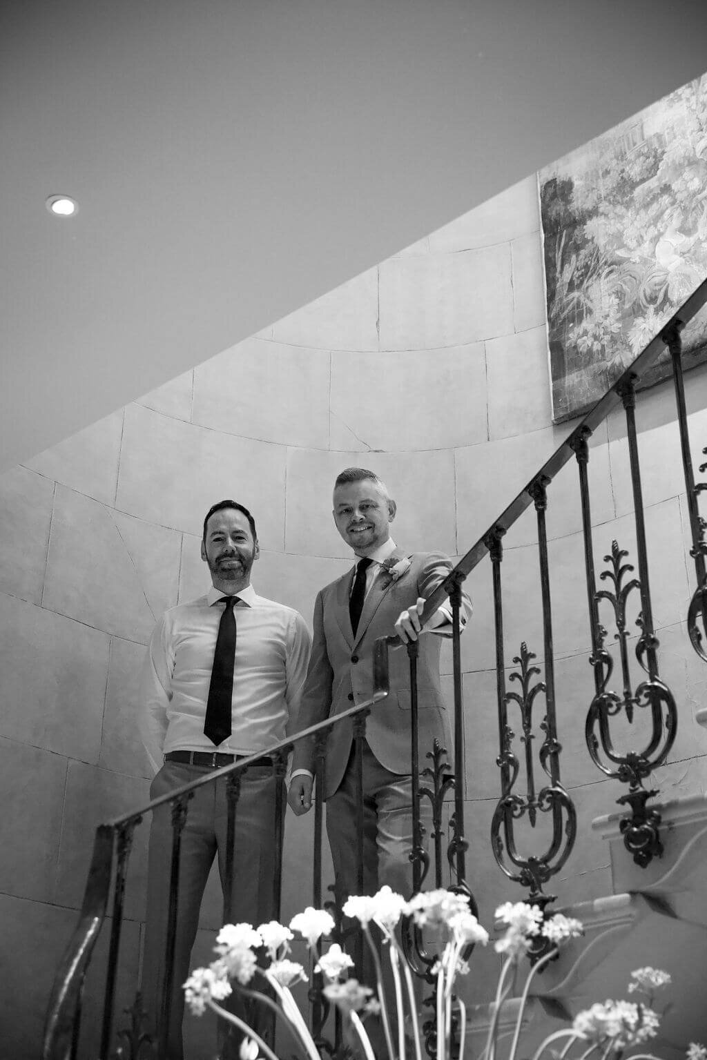 Two grooms stand on the steps of The Covent Garden Hotel