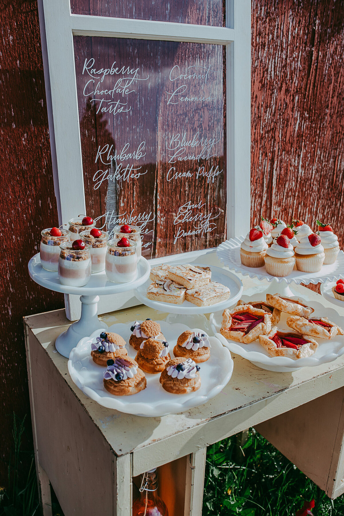Rustic desert table with vintage window, by Lemonberry Pastries, contemporary cakes & desserts in Calgary, Alberta, featured on the Brontë Bride Vendor Guide.