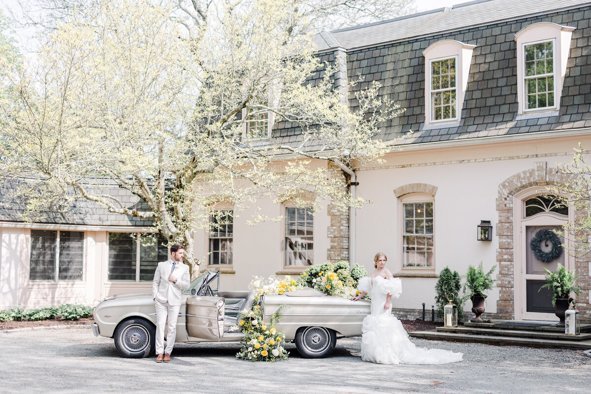 italian inspired wedding photoshoot of bride and groom with vintage car
