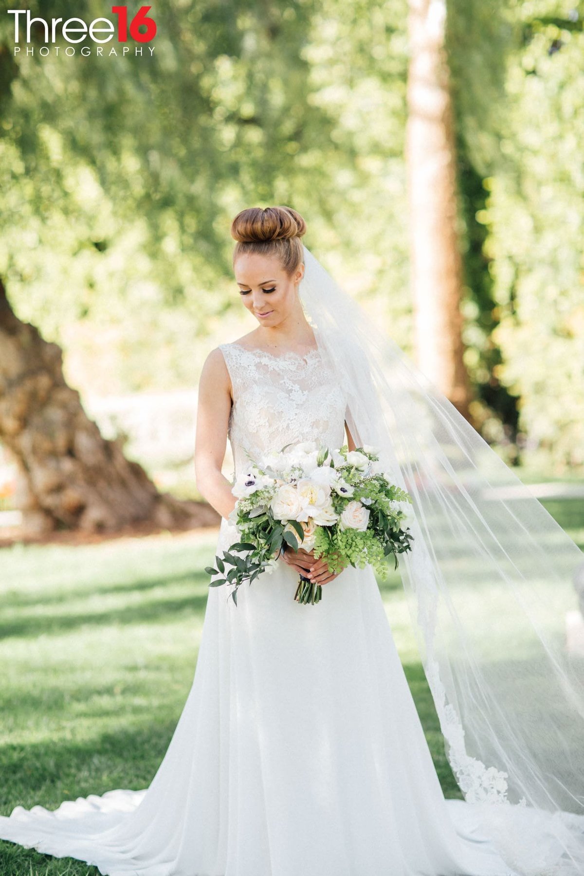 Beautiful Brides poses for the wedding photographer