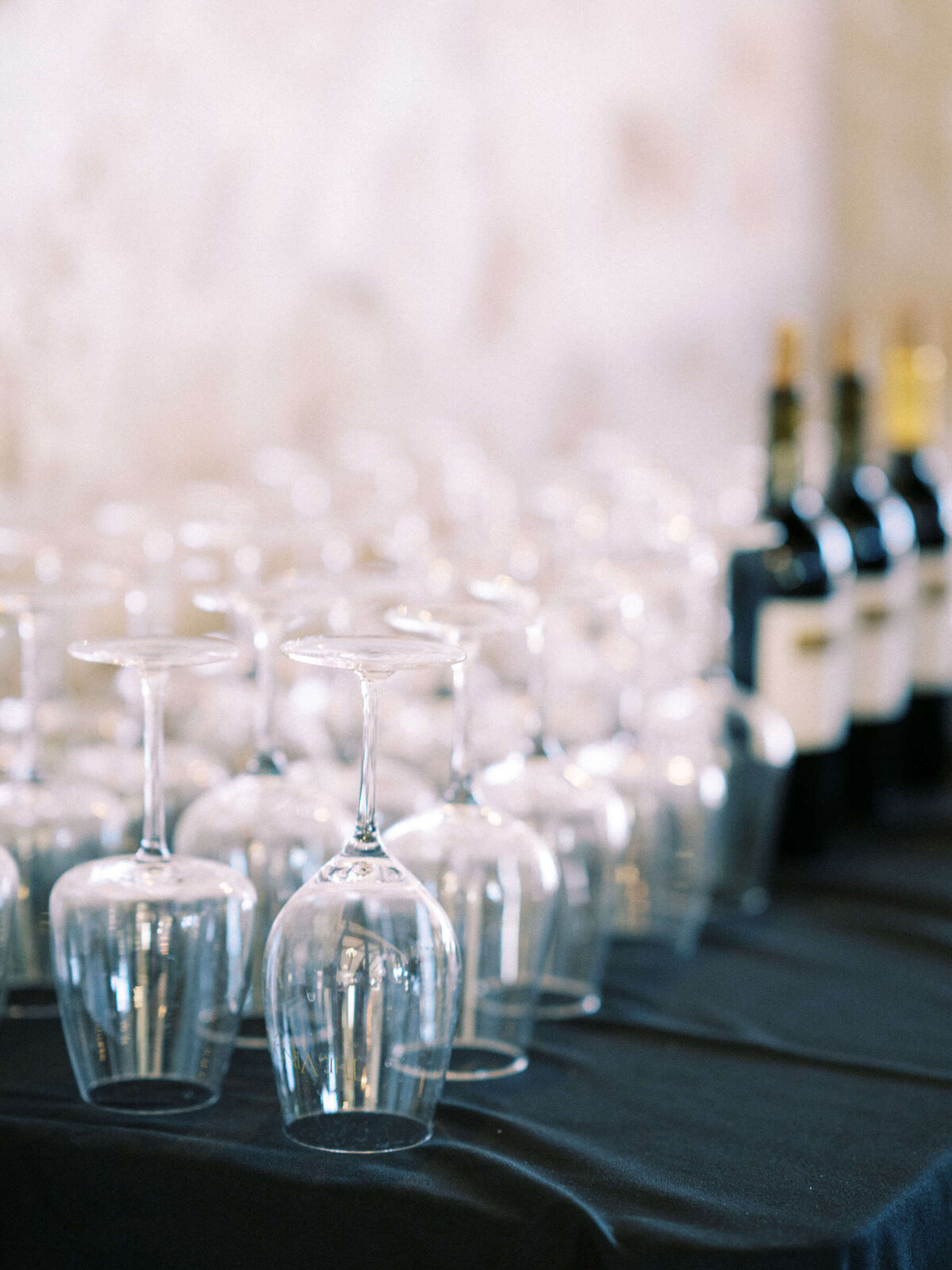 Wine glasses and bottles at Florence, Texas wedding