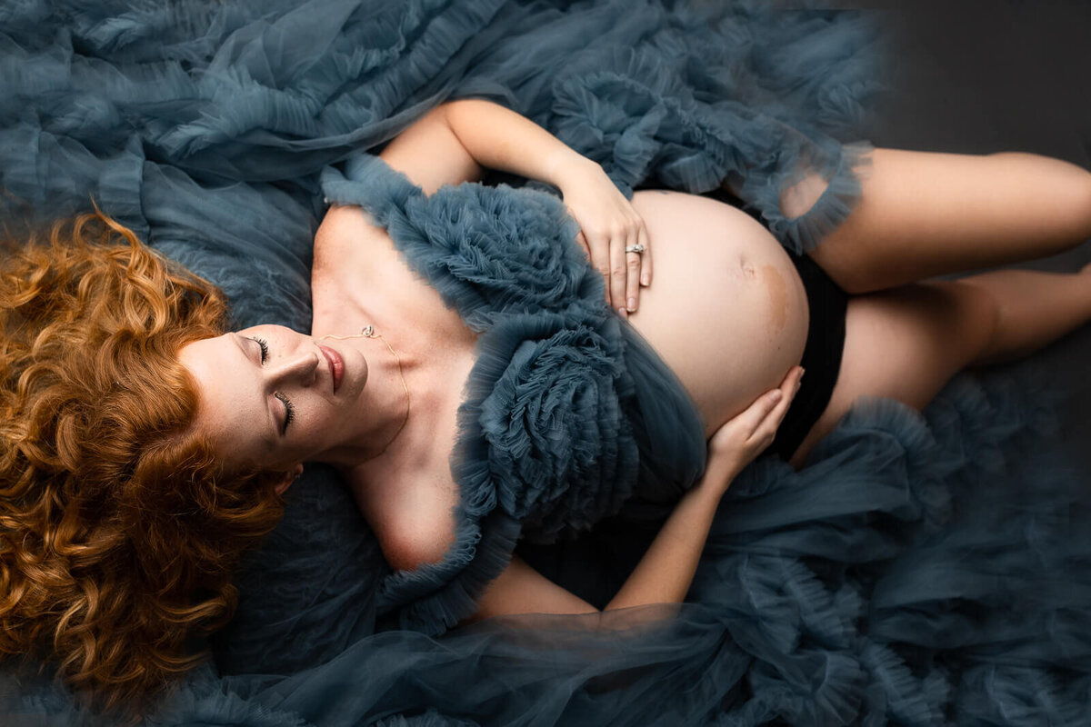 Beautiful top angle portrait of an expectant mother during her maternity photo session in Minnesota.