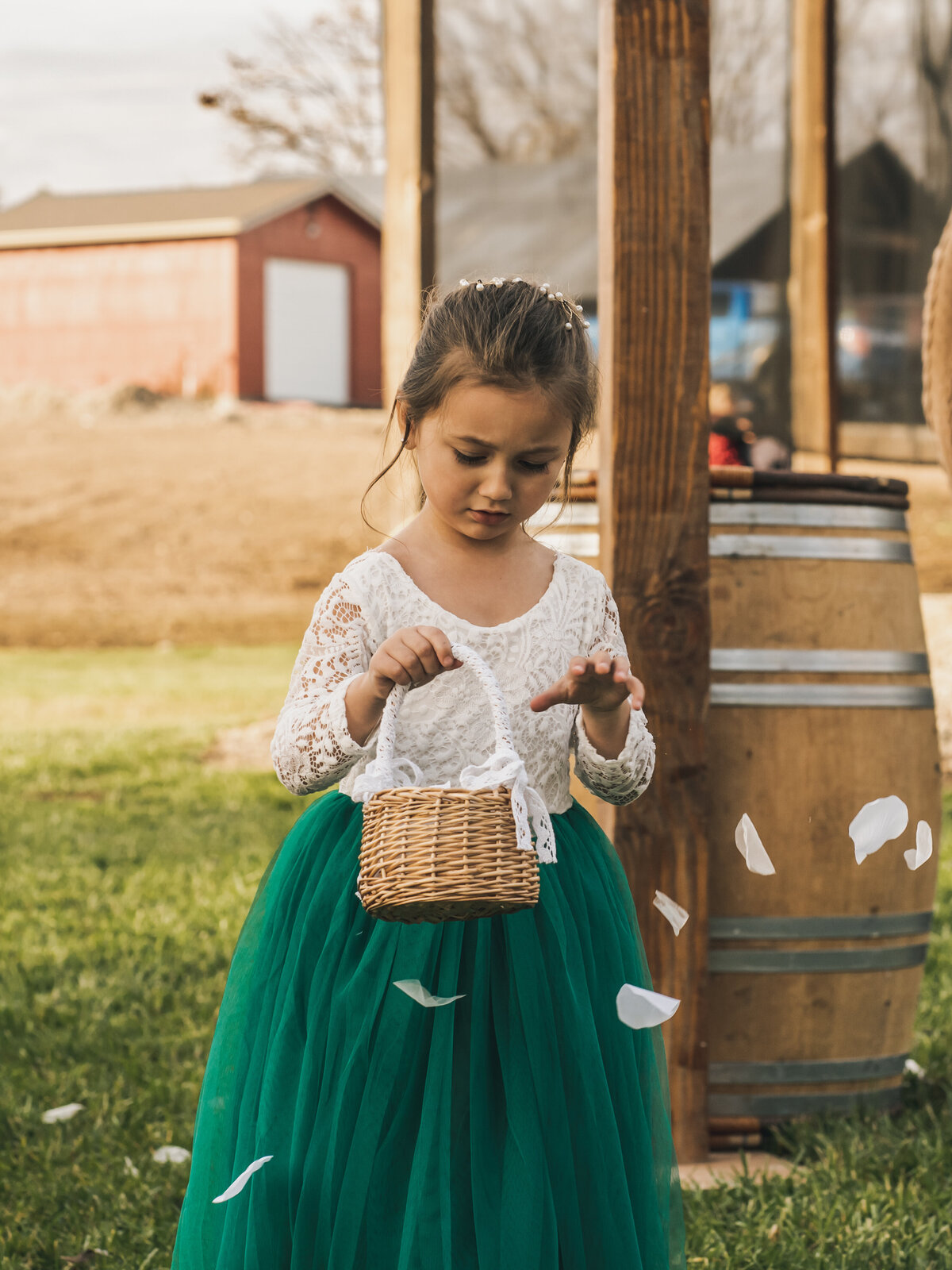 Flower girl captured by 4Karma Studio during a rustic wedding in Sonoma