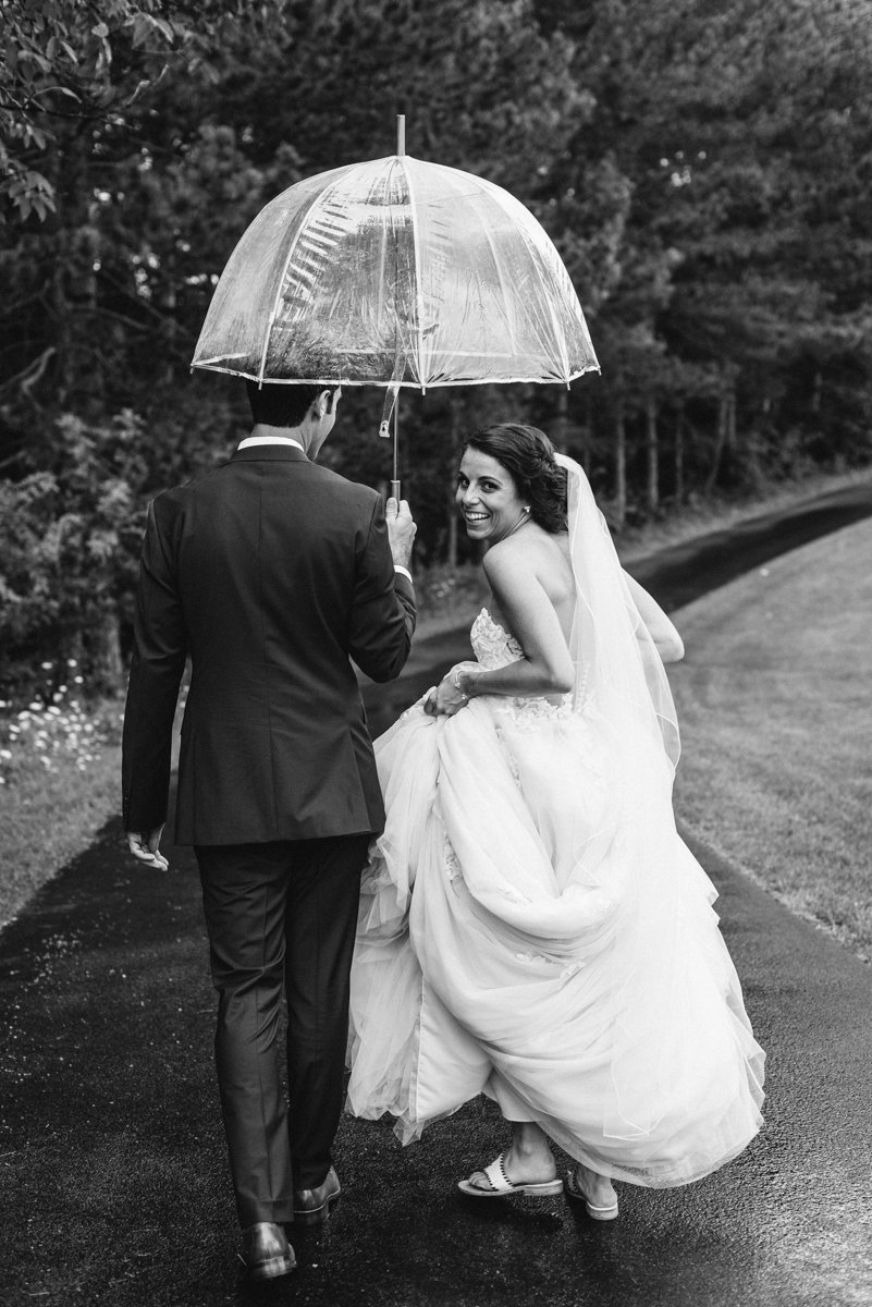 Rainy day black and white wedding photo