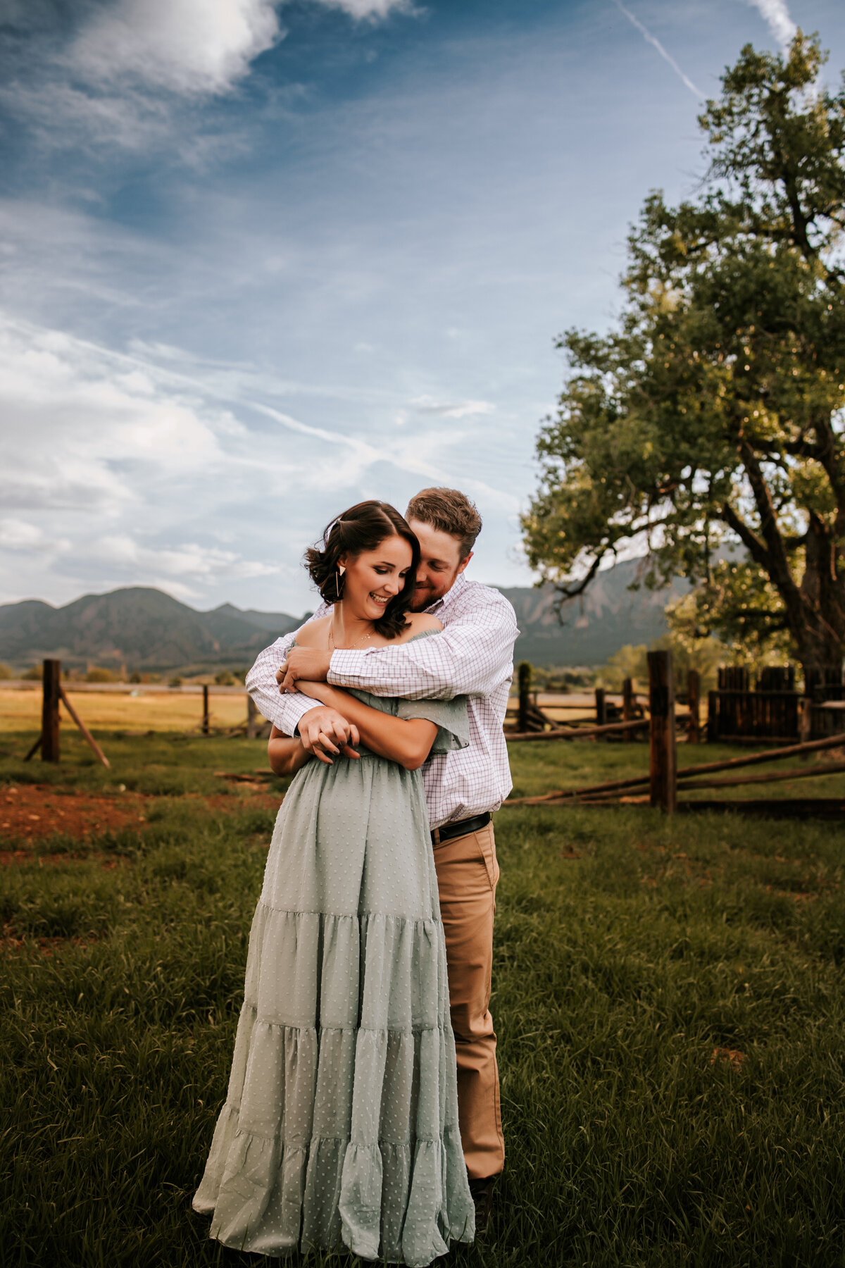colorado couple walk holding hands in boulder colorado for couples session