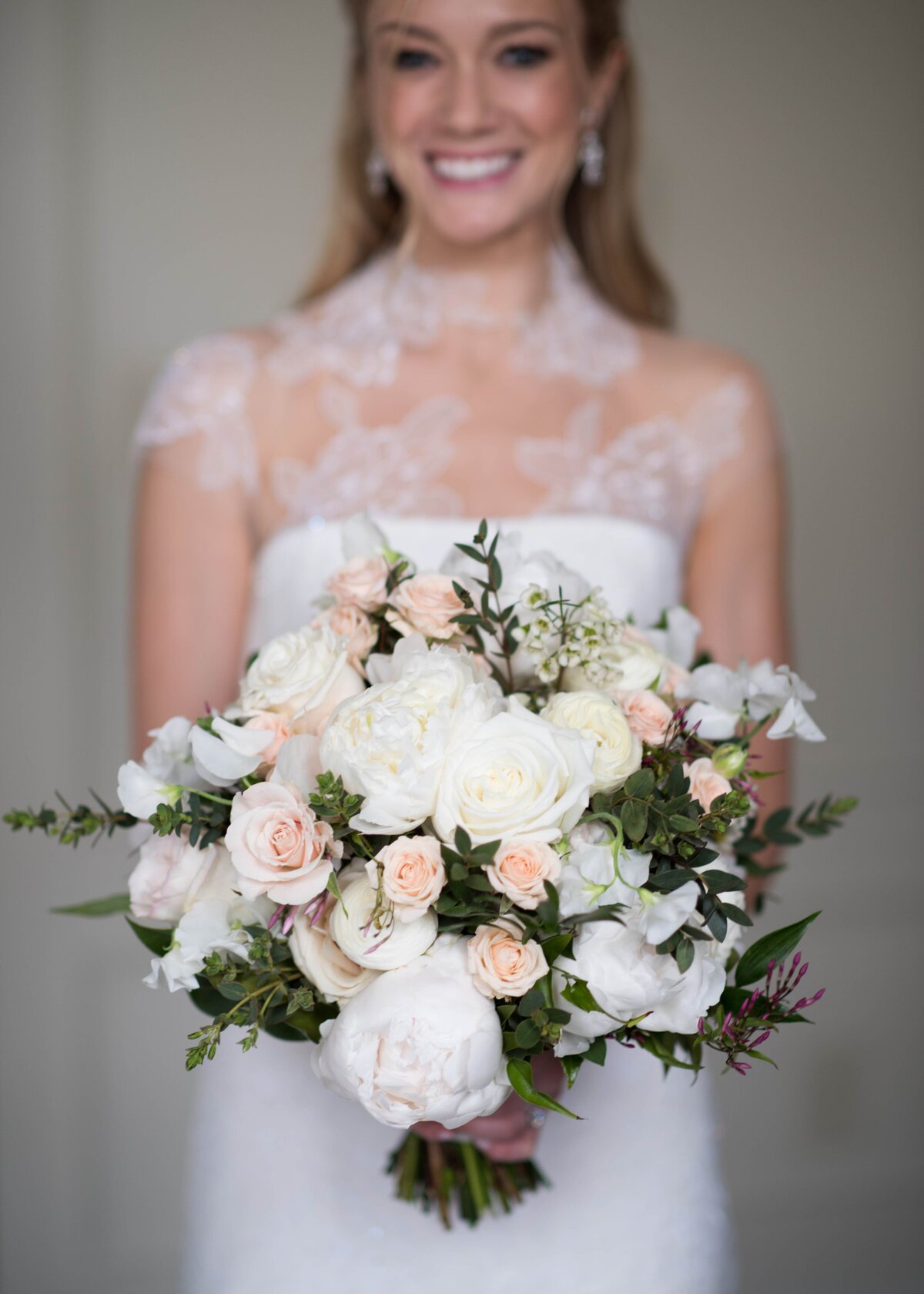 Bride holding gorgeous bouquet TTWD
