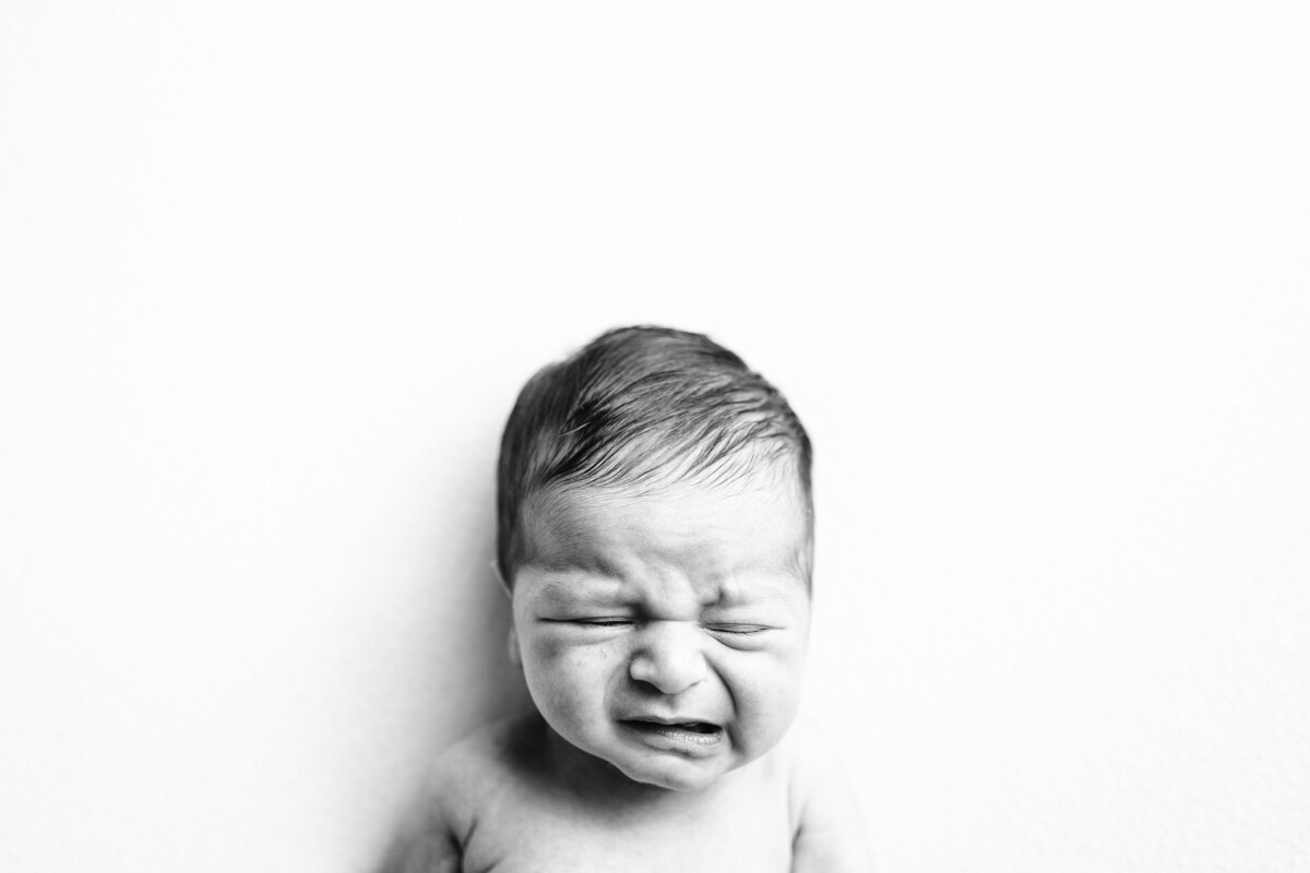 baby cries during photo session in tampa, fl