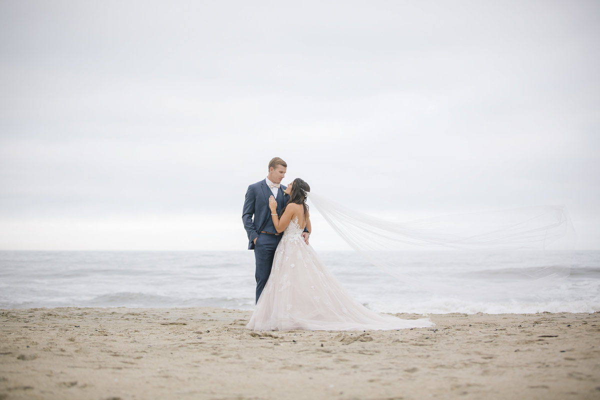 bride and groom on asbury park beach wedding