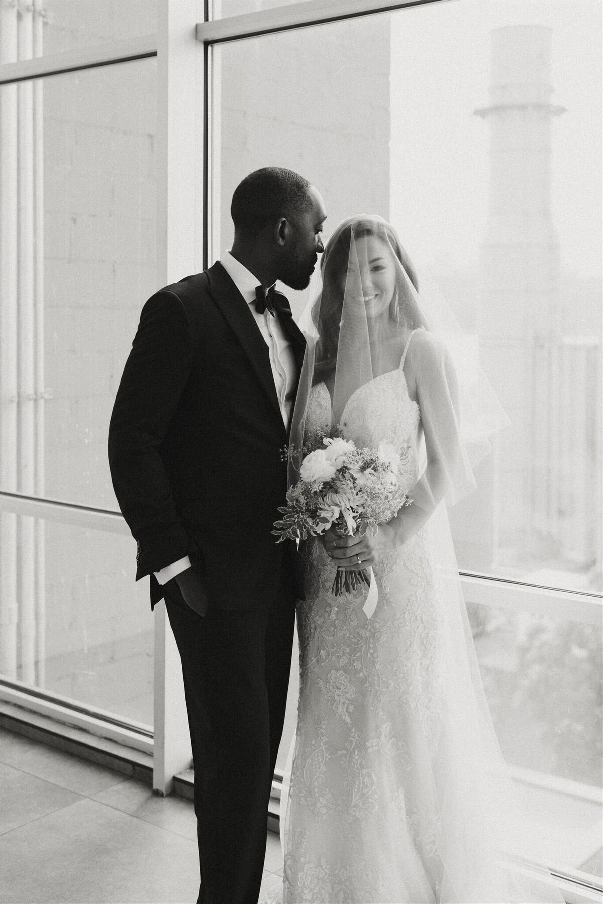 black and white wedding photos of bride and groom