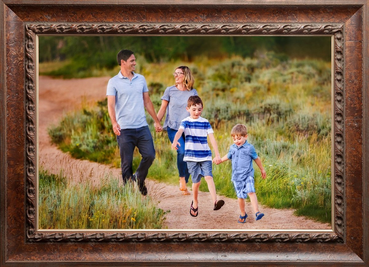Two little boys walking with their parents  on a path at Vedauwoo.