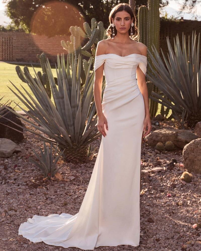 uploads_1718833423402-LP2445-Hollie-Satin+Off+the+Shoulder+Wedding+Dress+with+a+Slit+and+Sheath+Silhouette+1