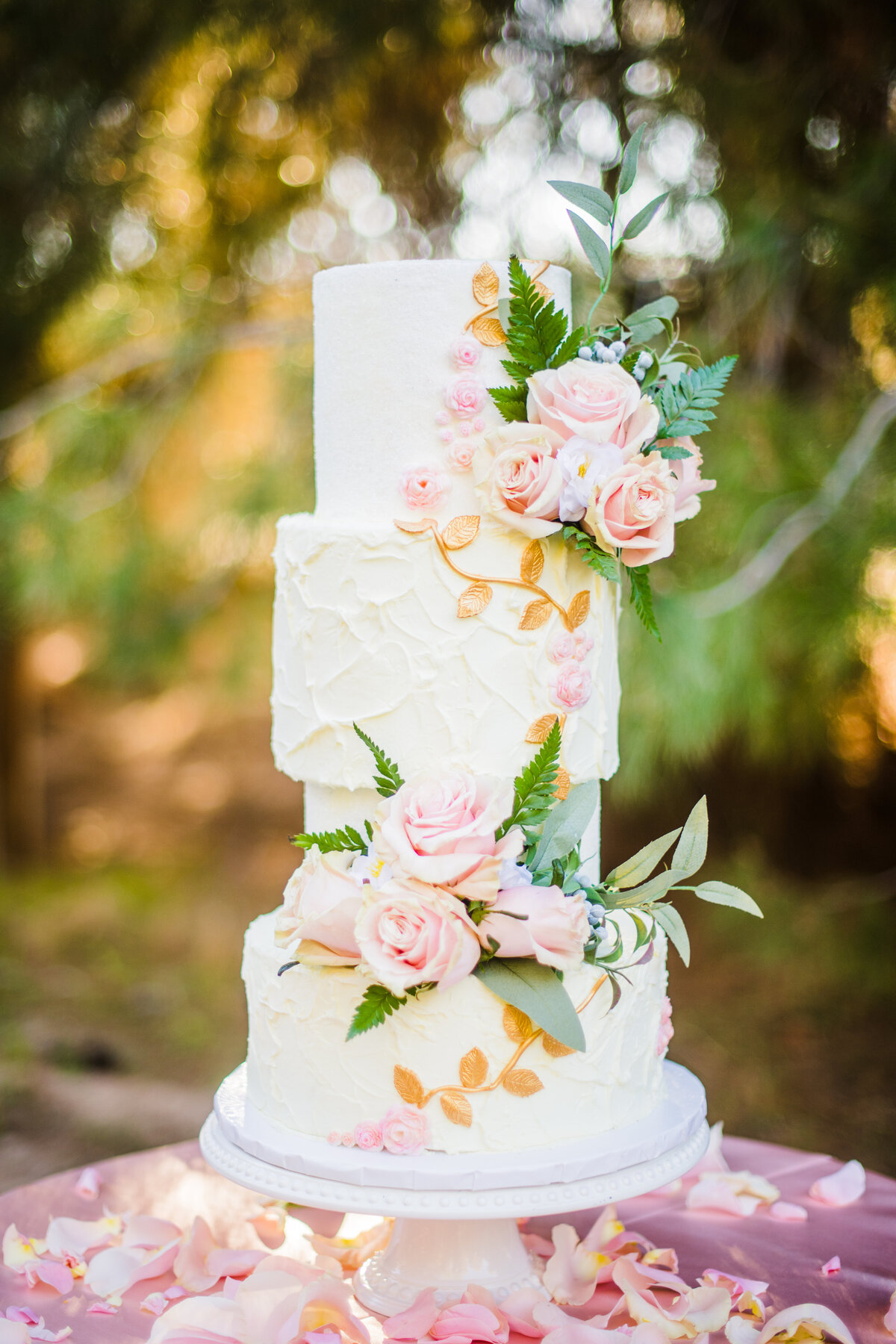 Wedding cake with flowers at Schnepf Farms Meadows Mesa Chandler wedding