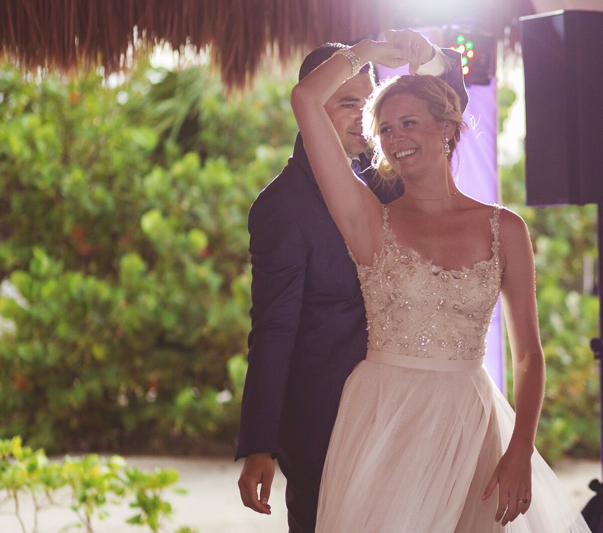 Bride and groom dancing for fist time at Cancun wedding
