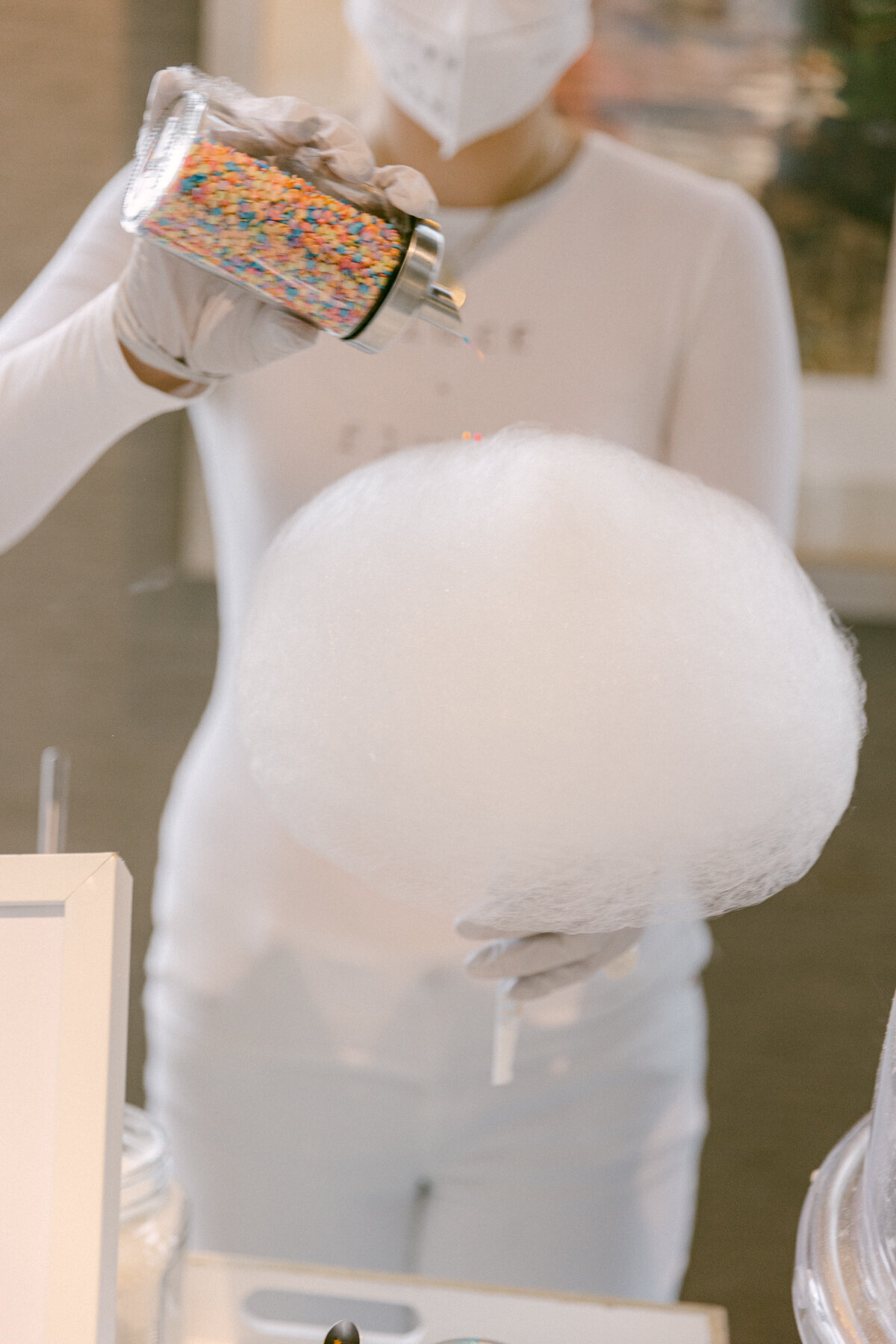 Person Serving Cotton Candy