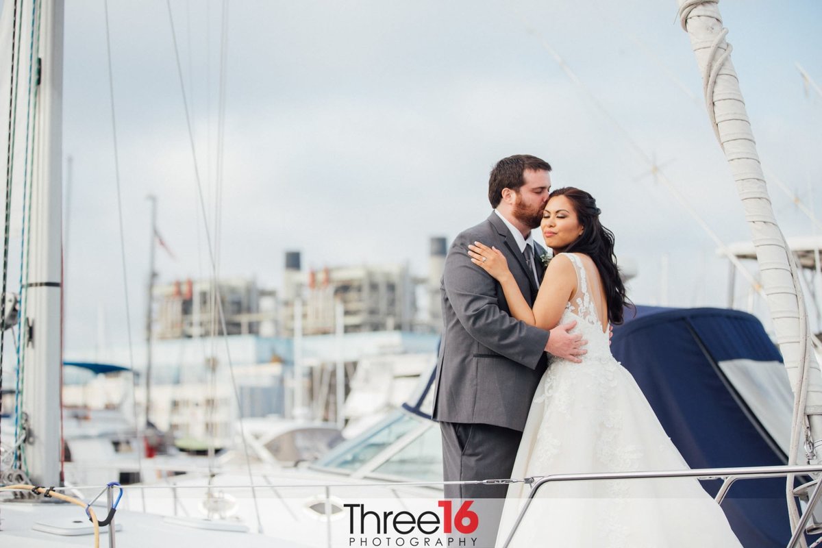 Bride and Groom share a nice moment together on a boat