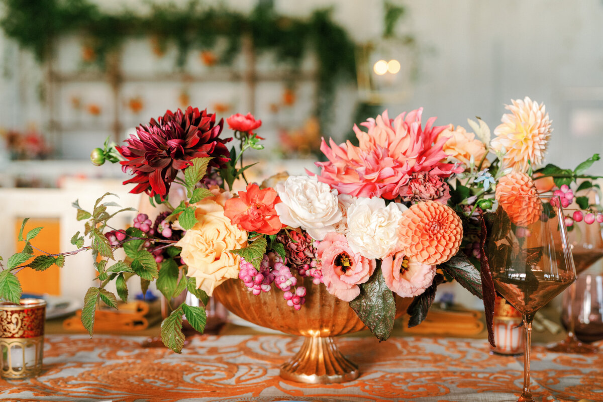centerpiece florals on guest tables at wedding