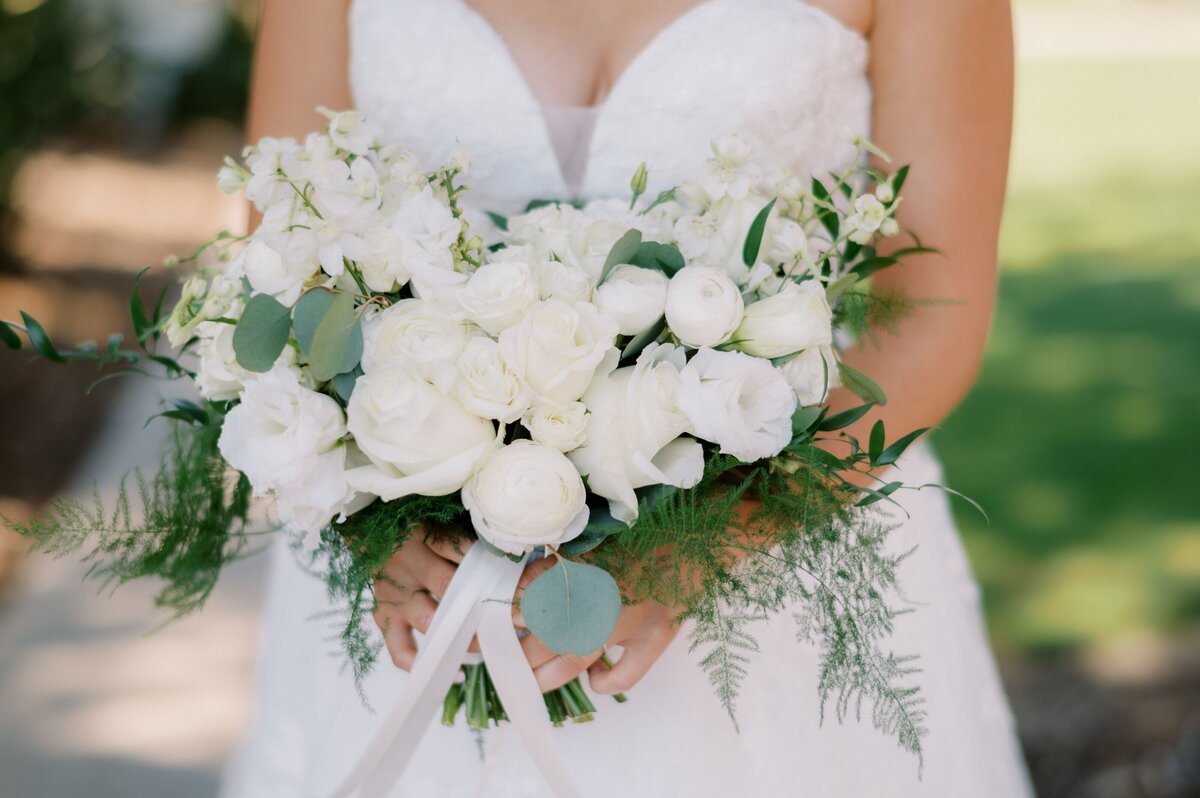 A large white bouquet for the bride by Primrose & Petals.