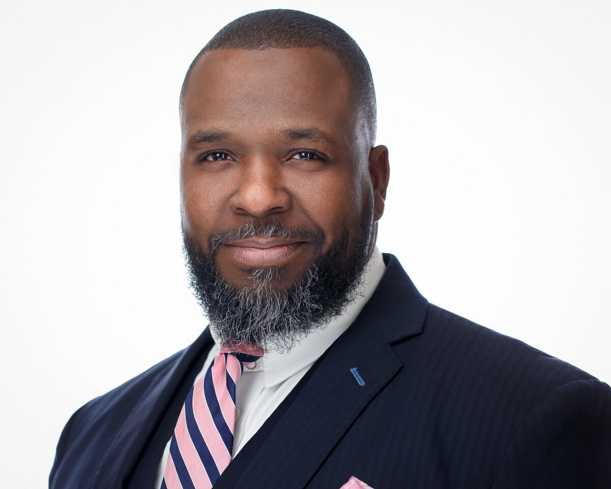 african-american-black-man-suit-tie-professional-linkedin-profile-pic-consultant-finance-money-salary-hired-jobs-north-denver-thornton-westminster-colorado-photo-camera-head-shot-crew-session-image-white-background-Yvonne-Min-Photography-Headshot-67