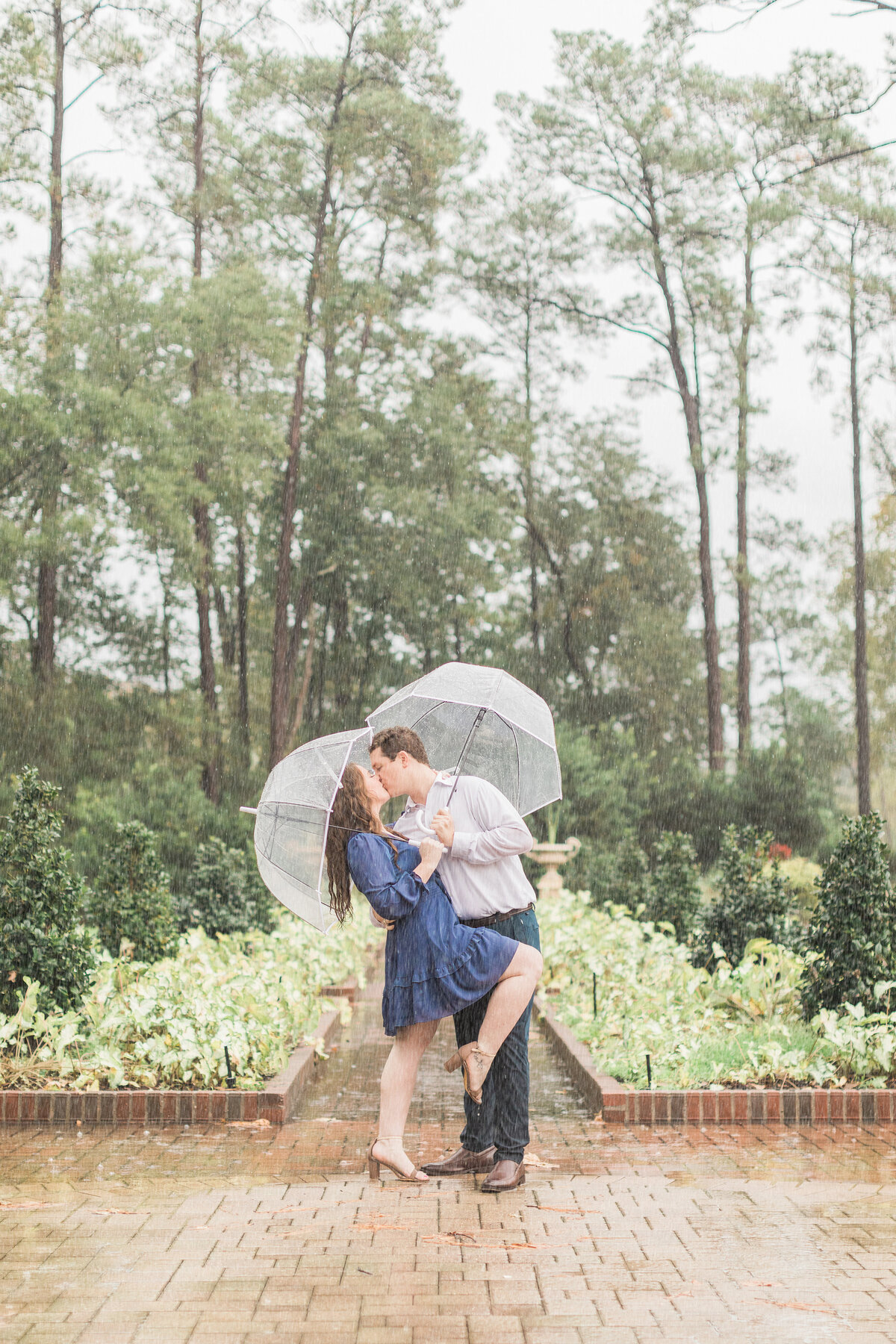 Houston-engaged-couple-in-rain
