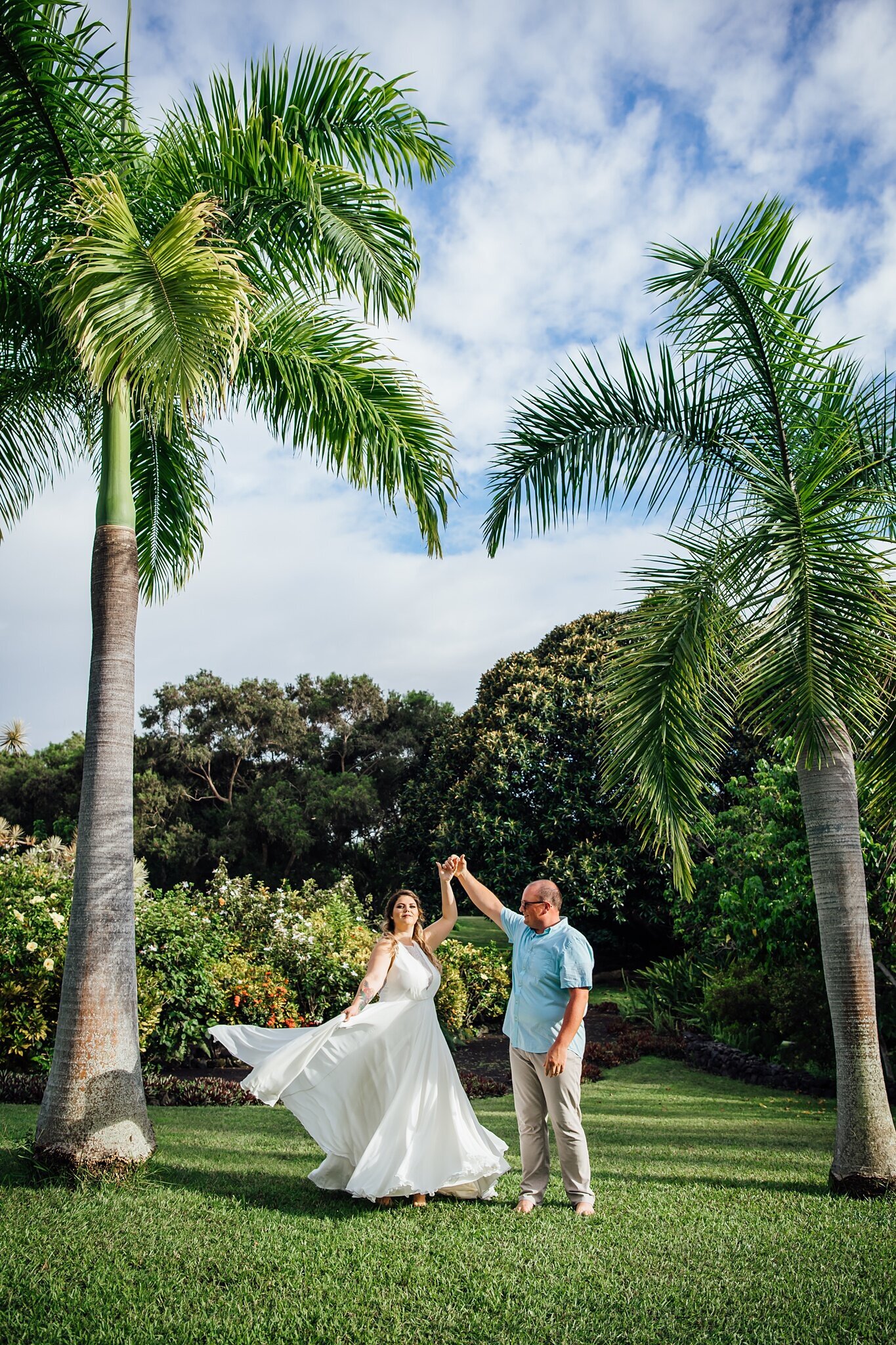 bride twirls on her big island hawaii elopement