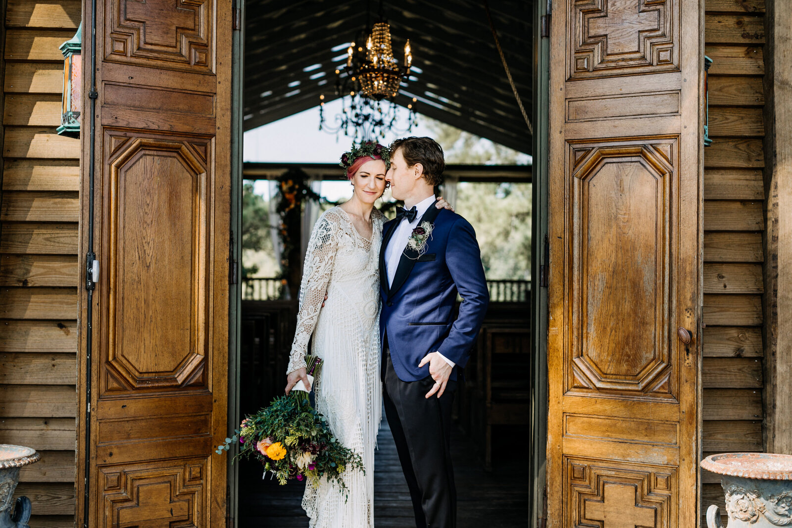 bride and groom vintage church doors