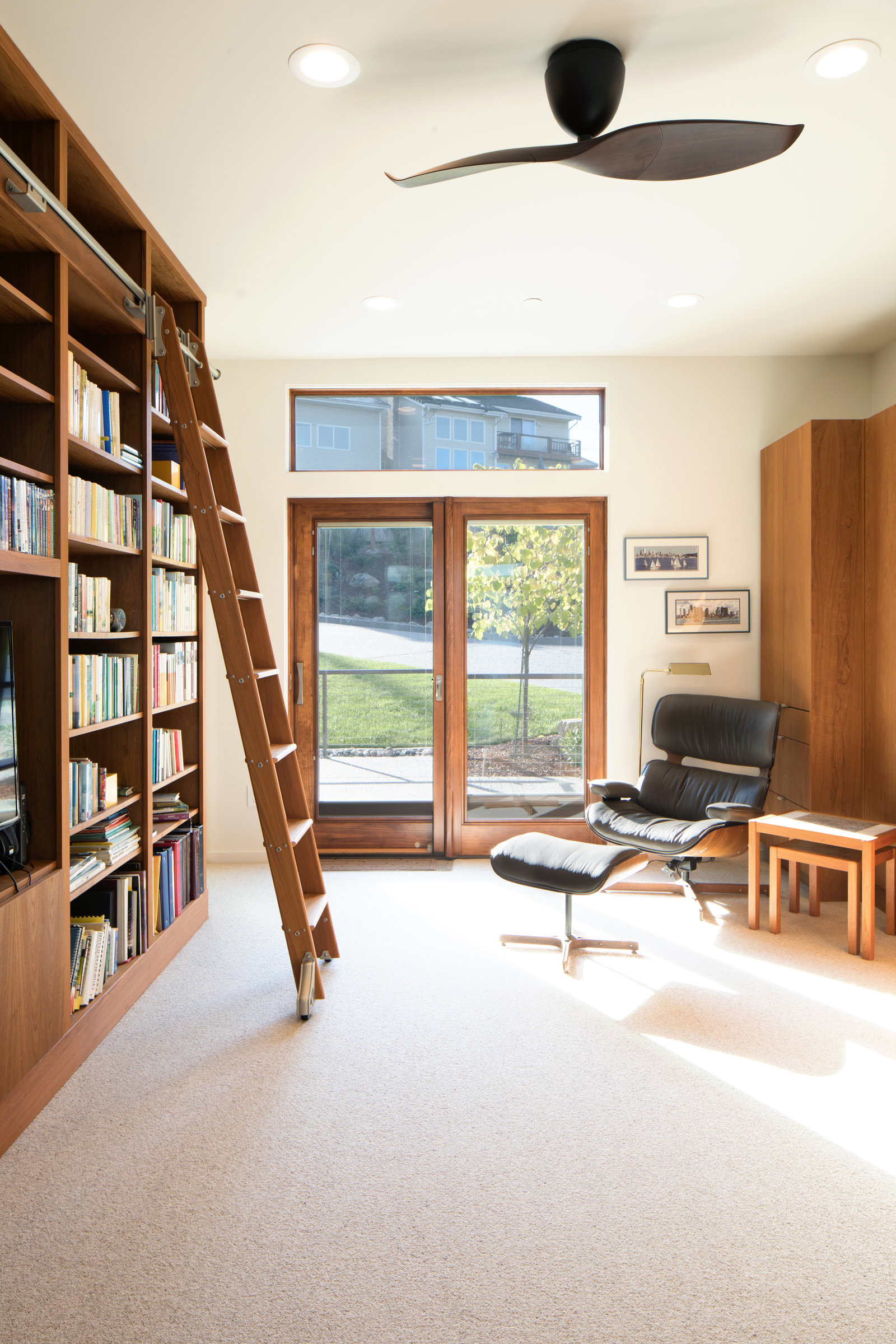 bright mid century modern in-home library