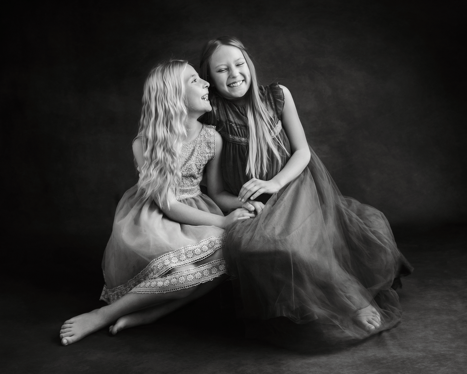 Laughter---Two-Sisters-in-dresses-BW
