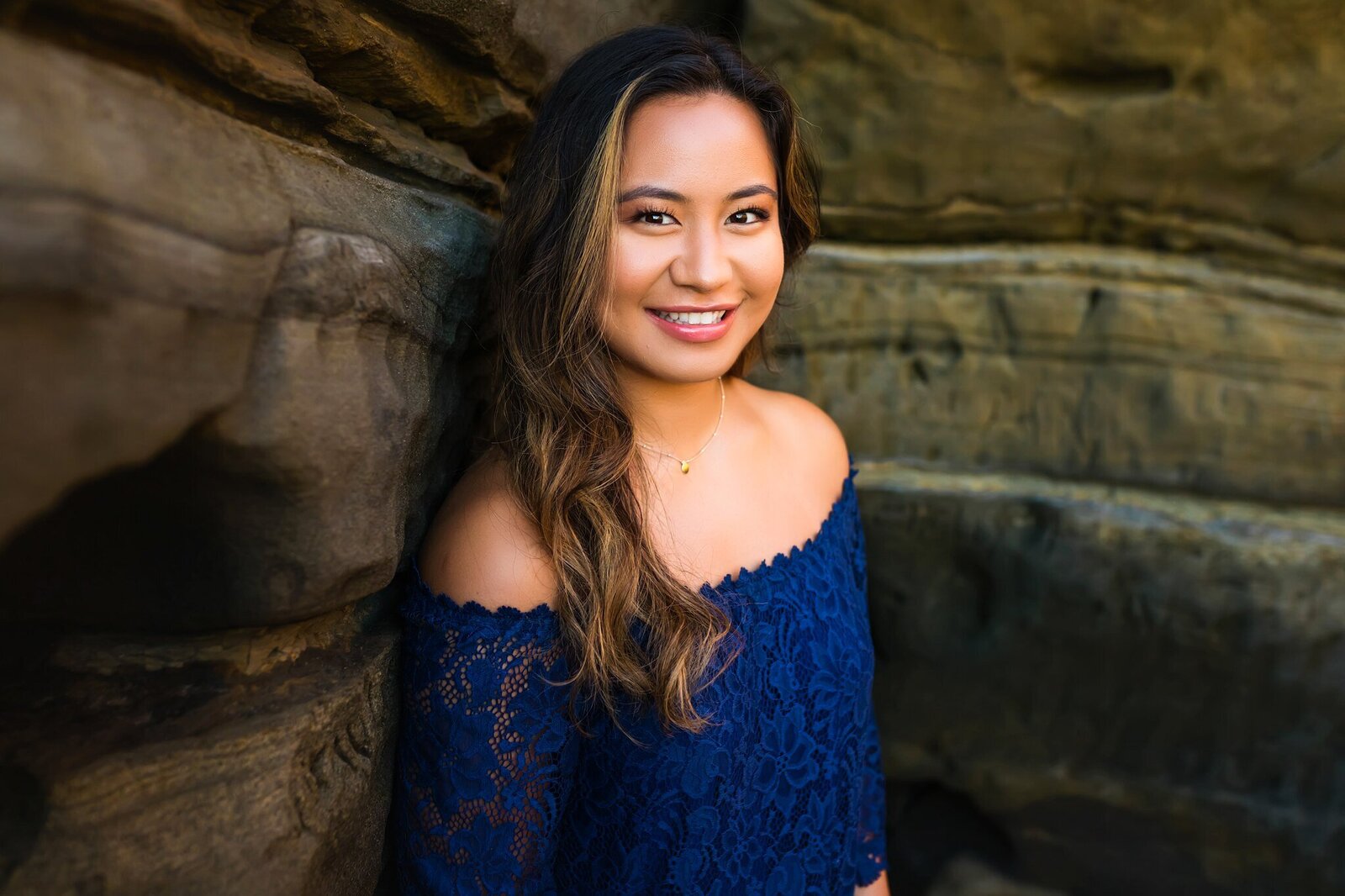 Head shot of senior girl in a cave in San Diego