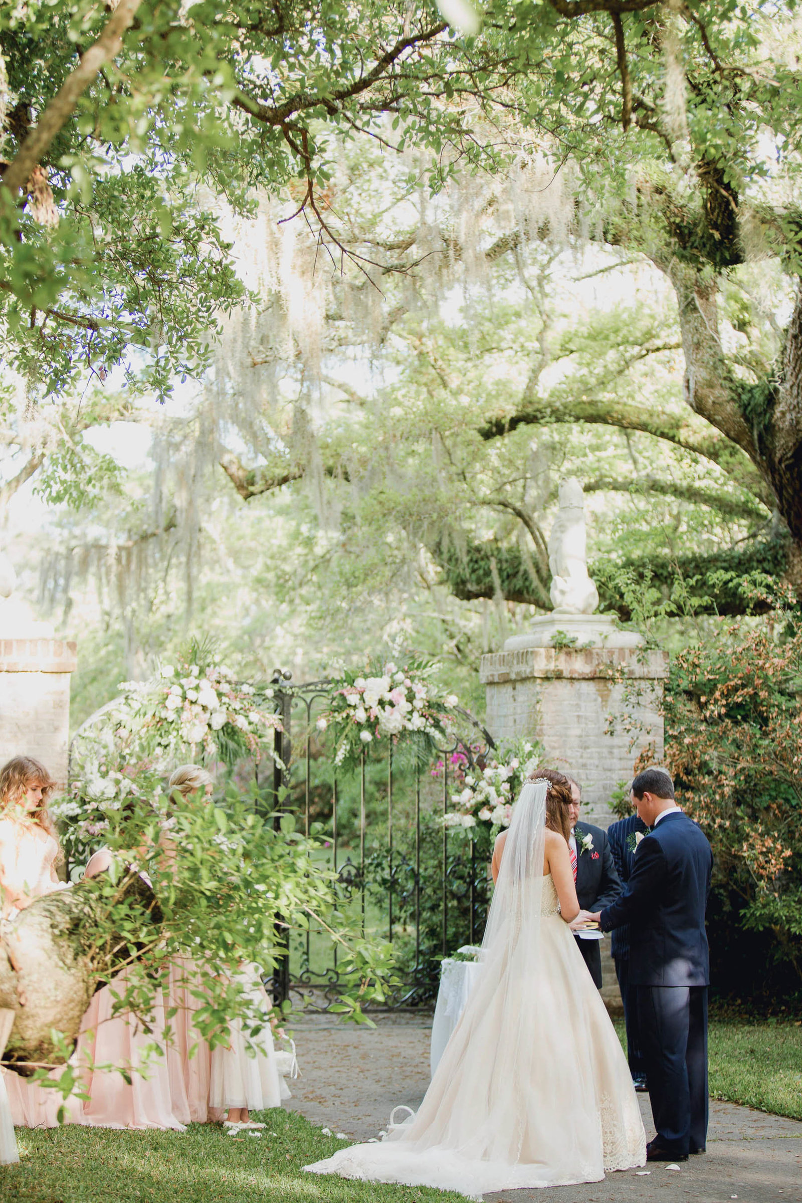 Bride and groom exchange rings, Brookgreen Gardens, Murrells Inlet, South Carolina