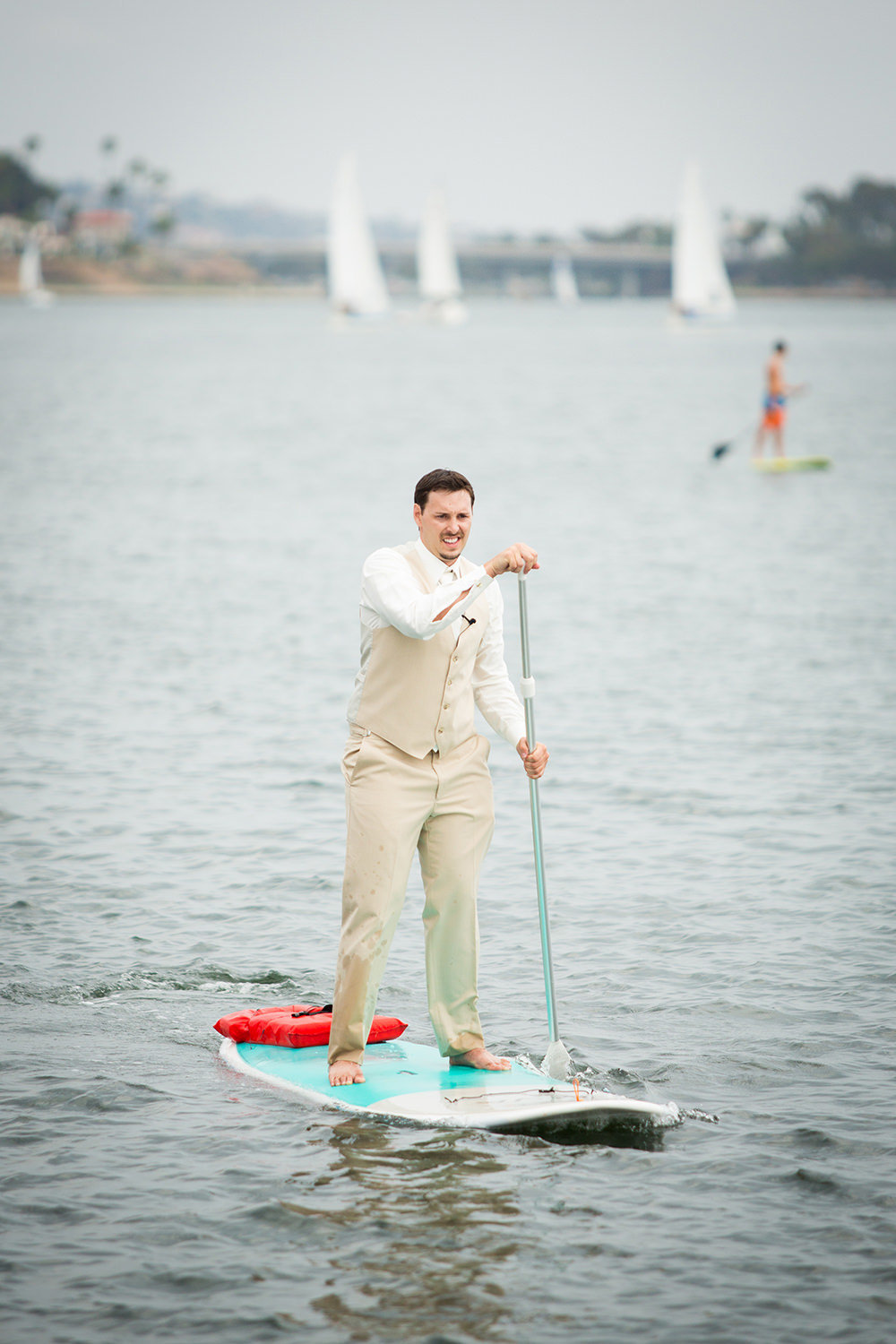 groom on a paddle board
