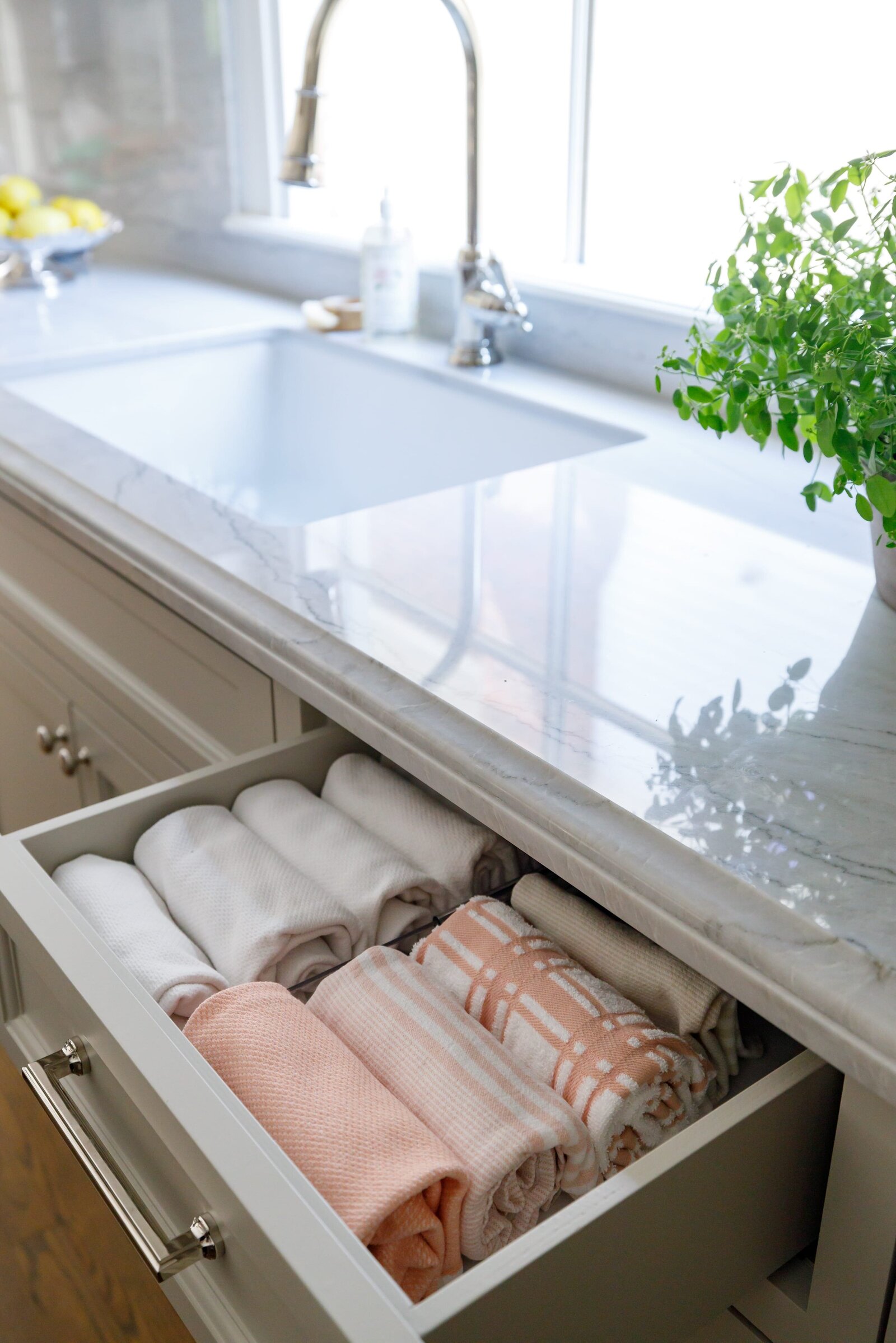 vision and hammer kitchen drawer with folded towels