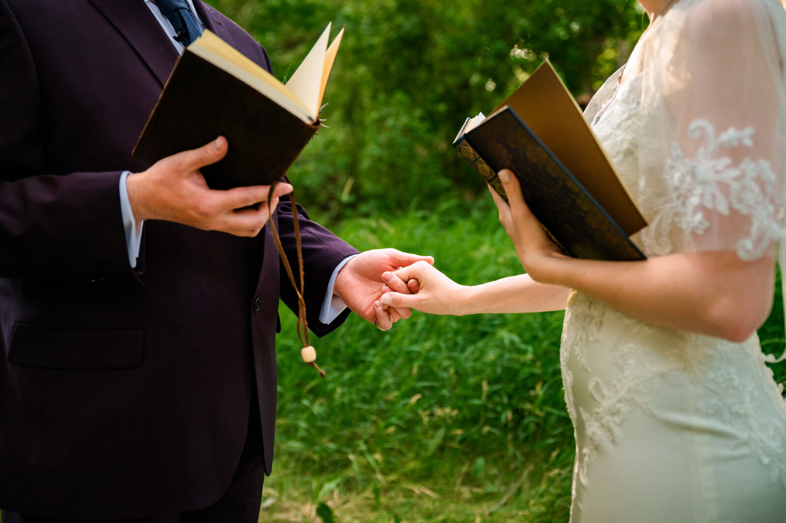 Jackson Hole photographers capture private vow reading before Grand Teton wedding