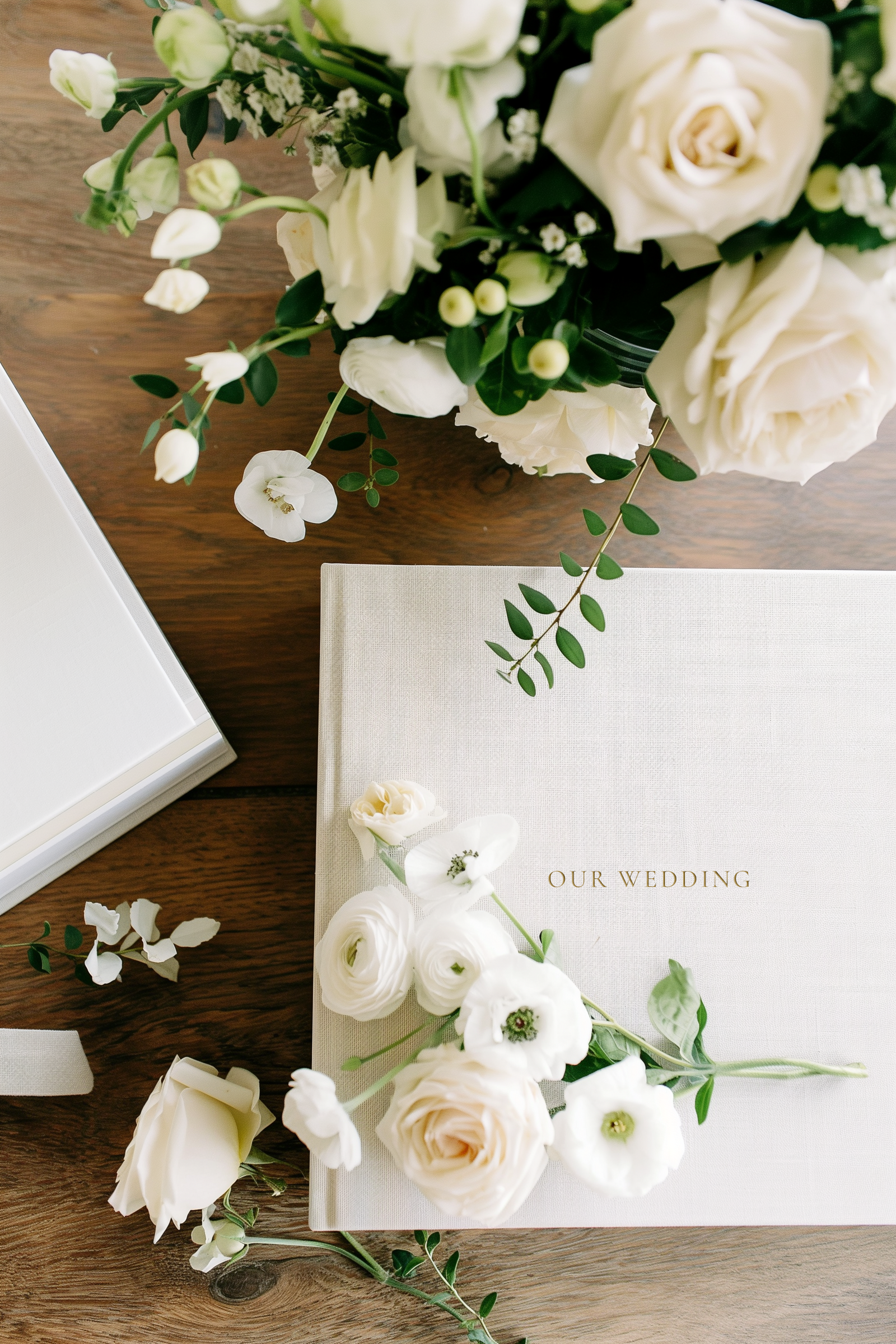 u2663311828_top-down_view_of_a_luxury_wedding_album_with_custom_3148017f-cbb9-4336-a363-07ca9834bcfc