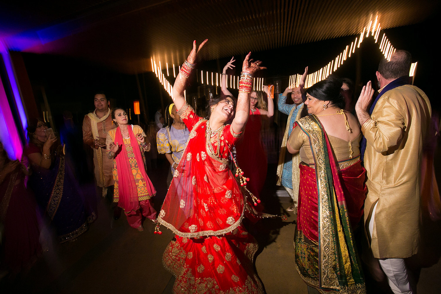 Dancing during the reception party at an Indian wedding