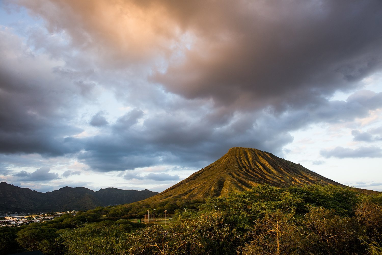 Sunset and dramatic clouds over Koko Head in Hawaii