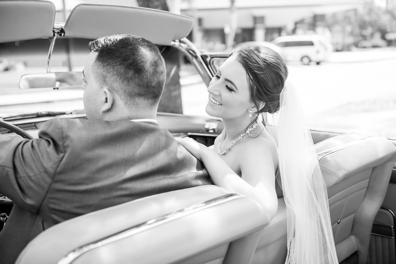 Newlywed Driving - Country Club at Mirasol Wedding - Palm Beach Wedding Photography by Palm Beach Photography, Inc.